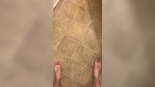 Hairy veiny uncut dick pissing with an erection on the bathroom floor - 12 image