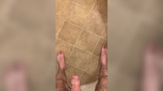 Hairy veiny uncut dick pissing with an erection on the bathroom floor - 14 image