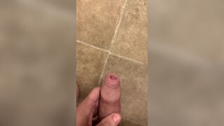 Hairy veiny uncut dick pissing with an erection on the bathroom floor - 6 image