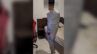 very lewd man being mummified by bearded dom - 14 image