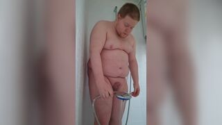 Undressed man sings in the shower - 2 image