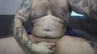 On the sofa Jerking my cock after work