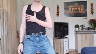 sexy undress in strap and fishnet nylons, then jerk off on the ottoman, then Spunk Fountain against a pane of glass