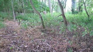 wearing very baggy underclothes outdoors in the woods to stripped