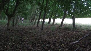 wearing very baggy underclothes outdoors in the woods to stripped
