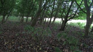 wearing very baggy underclothes outdoors in the woods to stripped
