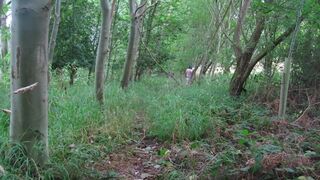 wearing very baggy underclothes outdoors in the woods to stripped