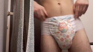 Hot boy wetts his diaper and changes it - 3 image
