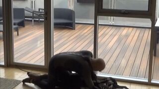 wetsuited silicone masked guy cums on his dummy at patio windows - 8 image