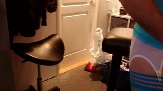 Crossdresser dressing up in sexy lingerie and high heels