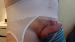 Crossdresser dressing up in sexy lingerie and high heels