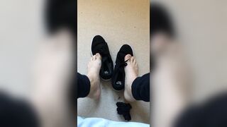 Bare foot taken out of trainers - 1 image