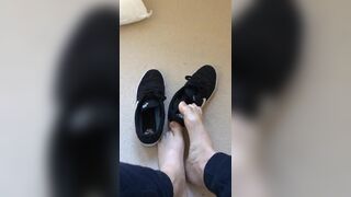 Bare foot taken out of trainers