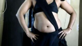 Krithi Sexy Navel Tease in Black Saree, Indian Crossdresser - 1 image