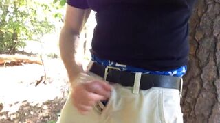 Im beating off in the woods in my blue boxers by a tree. - 3 image