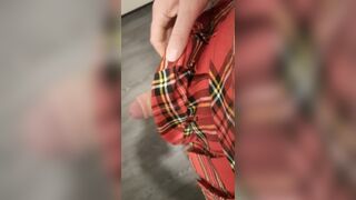 Guy masturbates in skirt