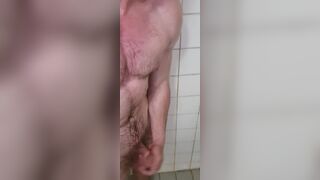 muscle guy jerks off in the shower - 10 image