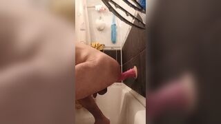 guy fucks himself with a dragon dildo in the shower - 5 image