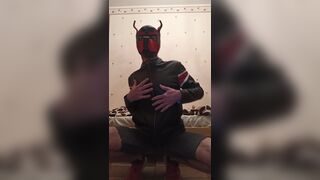 The puppy shows his body in leather