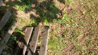 Cute twink boy enjoys the sunset in the mountains
