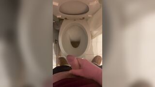 a guy pisses and then masturbates in the bathroom, cumming with his nice cock all over the place - 9 image