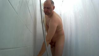 Kudoslong in shower shaves his small flaccid cock and body - 2 image