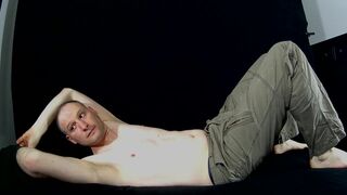 Kudoslong strips for the camera and shows his flaccid cock