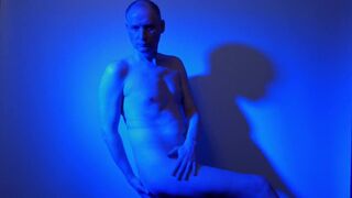 Kudoslong nude in a blue light playing with his flaccid cock - 14 image