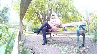 Slutty Michellemaidstone dressed in public on a park bench - 1 image