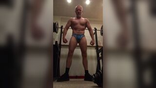 Bodybuilder flexing dribbling precum then shooting a load! - 7 image