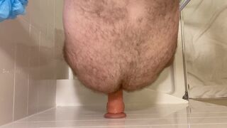 Top down view of dildo riding while standing in shower - 10 image