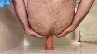 Top down view of dildo riding while standing in shower - 12 image