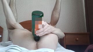 man / boy fucks himself with a bottle in the ass (anal) - 4 image