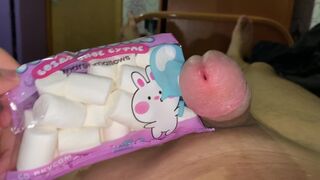 Guy Jerks off and Cums to Eat Marshmallow with Sperm - 1 image