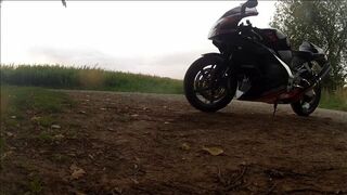 alo biker in a video with my aprilia in leather suit - 1 image