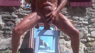 Gaping Man riding a huge dildo outdoor - 10 image