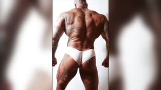 Spaniard muscle tattoo show of his body - 8 image