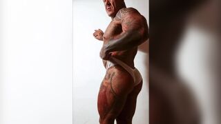 Spaniard muscle tattoo show of his body - 9 image