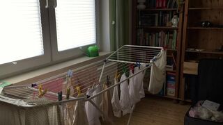 CD Crossdresser Hanging up laundry in DW Lingerie - 1 image