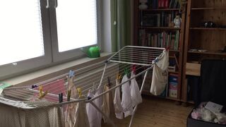 CD Crossdresser Hanging up laundry in DW Lingerie - 12 image