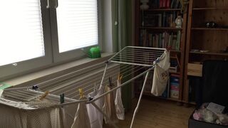 CD Crossdresser Hanging up laundry in DW Lingerie - 7 image