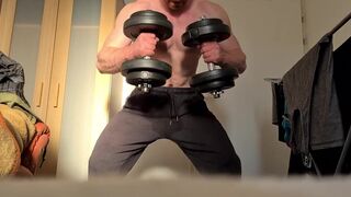 Muscular guy is doing exercises and jerking off
