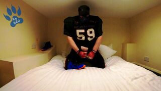 Football Pup pawing in hotel - squirting on my Flightposite - 1 image