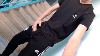 skinny russian lad wanks and cums in trackies - 2 image