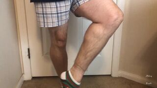 Man does Calf Flexing with X-Mas Socks - 1 image