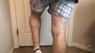 Man does Calf Flexing with X-Mas Socks - 2 image