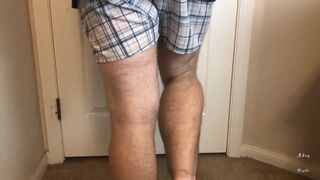 Man does Calf Flexing with X-Mas Socks