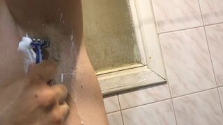 Guy Shaves his Armpits in the Bathroom - 2 image