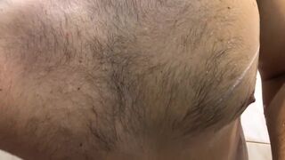 Guy Shaves his Armpits in the Bathroom - 4 image