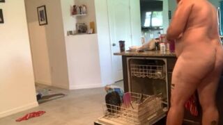 Dad bod naked man doing dishes - 10 image